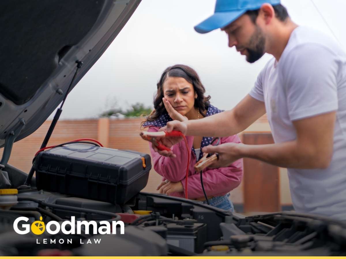 A man inspecting electrical problems in his new car, focusing on battery issues